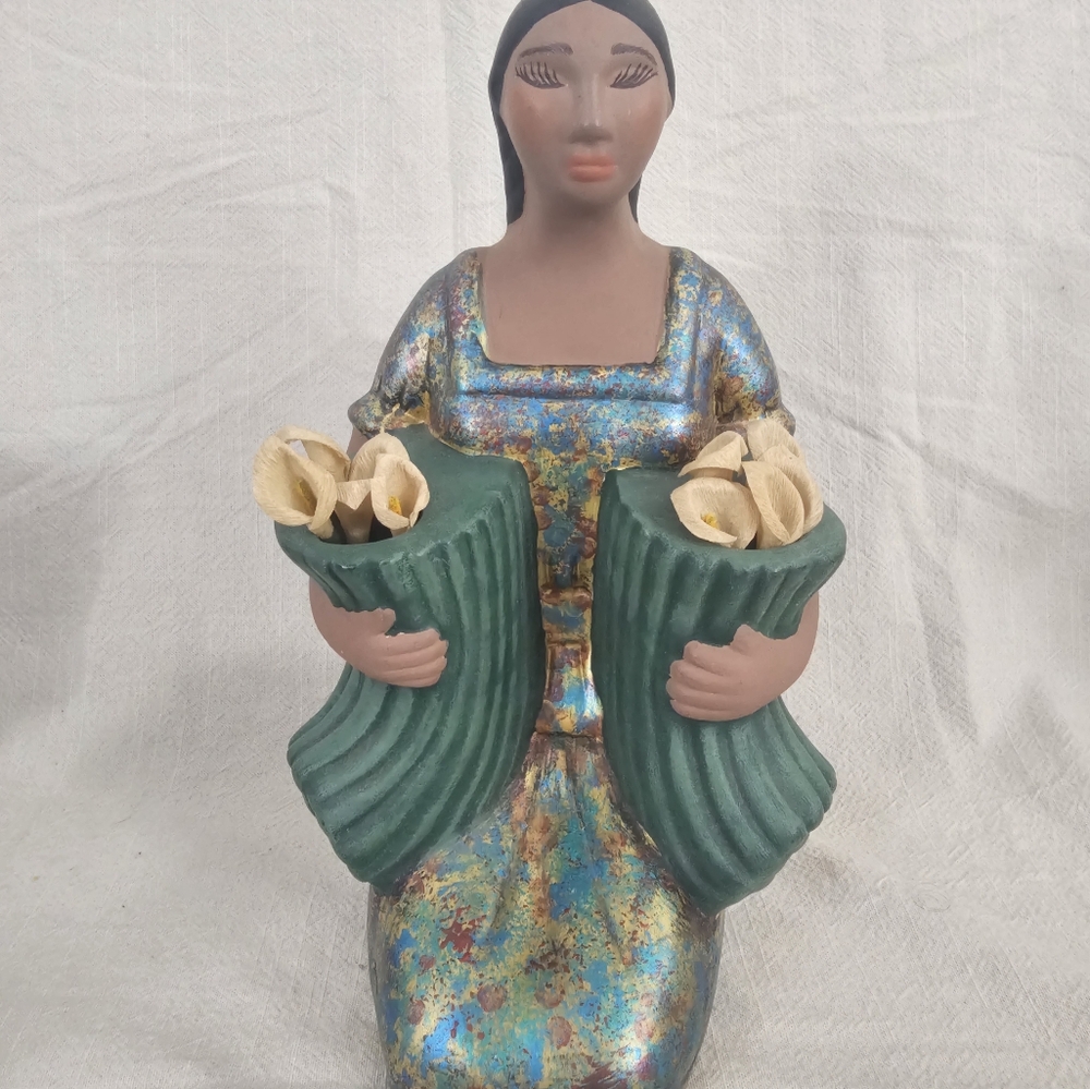 Colorful Ceramic Figurine with Flowers